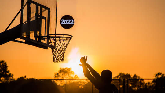 2022 – The Year of Activation basketball playing shooting a 2022 ball into the hoop