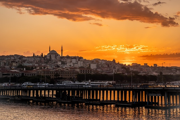 On Water and the Interconnection of All Things the city of Istanbul and dock stretching out into the sea