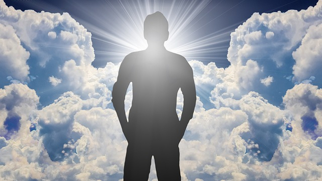 Creating A Prosperous World For All a man standing in front of a bright sky