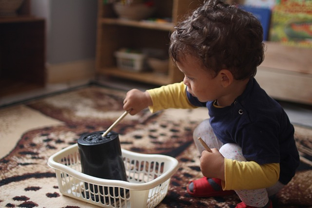Does Montessori Education Live up to Its Claims? child playing with educational tool