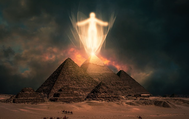 Are Ghosts Real? The Top Eleven Signs of a Haunting a ghostly figure above the pyramids