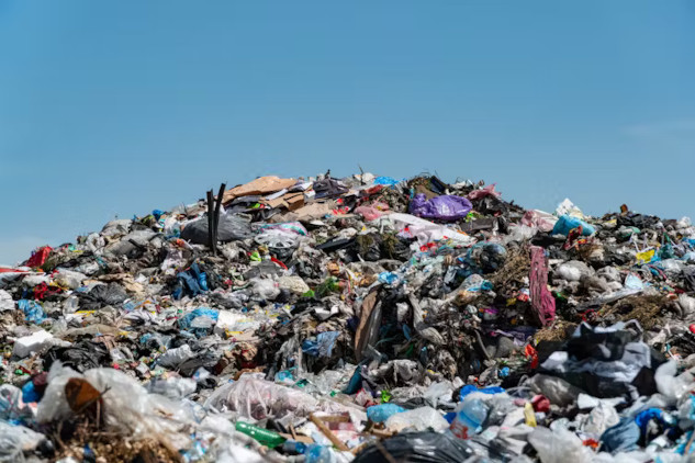 PCB Environmental Impact: The Hidden Threat 40 Years After the Ban Suggested Alt Image Text: A degraded landfill leaking into nearby soil and water, illustrating the ongoing threat of PCB pollution to the environment.