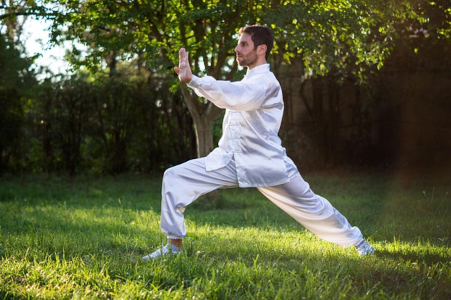 Chi Kung for Beauty: Energize Your Skin from Within A man practicing Chi Kung in an outside setting. Image by franciscojcesar from Pixabay.
