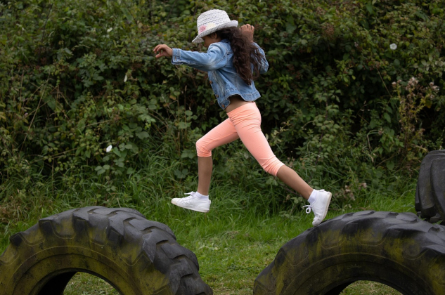The Purpose and Experience of Being Human Young woman jumping from one challenge to another in an obstacle course. Image by Kev from Pixabay.