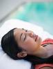 © Thinkstock Woman relaxing.